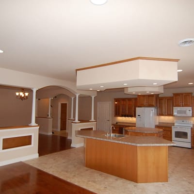 Bright, spacious kitchen with wooden cabinetry