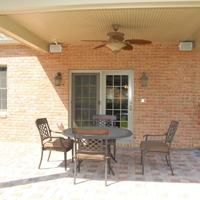 Outdoor patio area with table and chairs