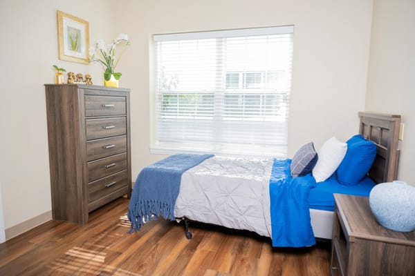 Cozy, well-decorated resident room with natural light