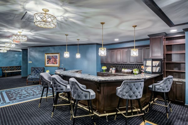 Interior view of a stylish common area with a bar