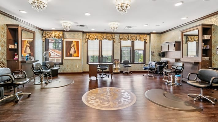 Interior view of a salon area with styling chairs