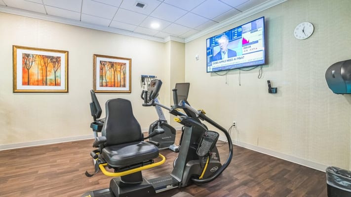 Fitness equipment in a bright exercise room