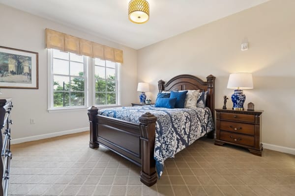 Well-furnished resident room with natural light