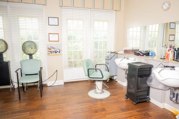 Interior of a beauty salon with salon chairs and equipment