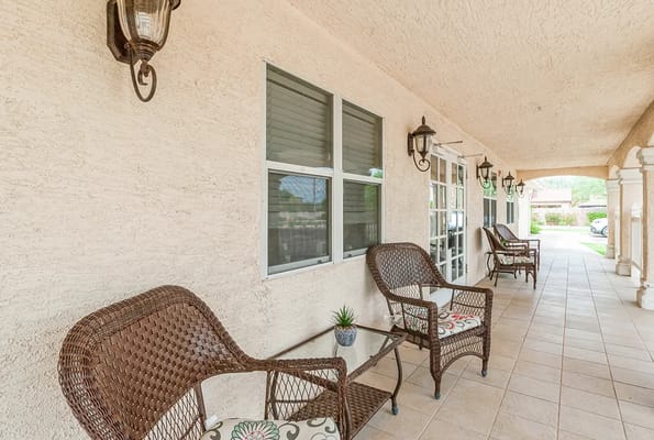 Outdoor seating area with chairs and table