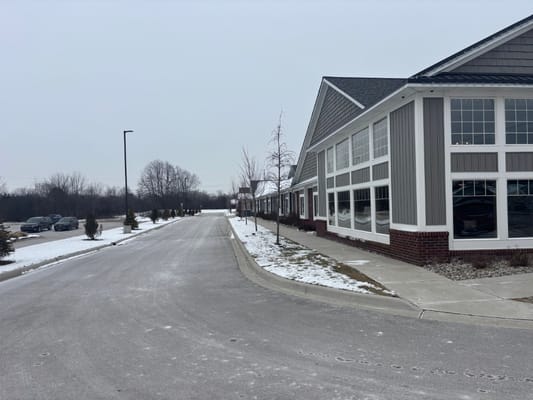 Exterior view of Hampton Manor building in winter