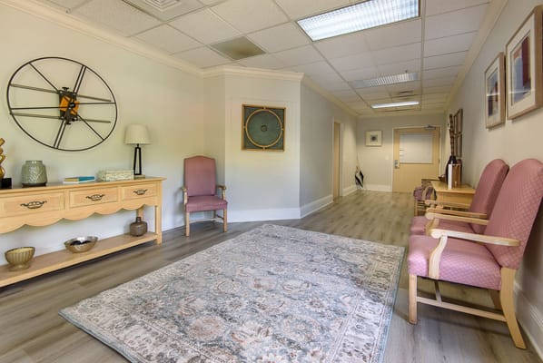 Bright interior hallway with seating and decor