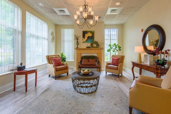 Bright interior common area with seating and decor