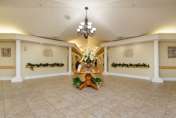 Welcoming interior lobby with floral arrangement