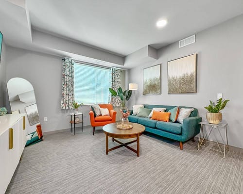 Cozy lounge area with colorful furniture and decor