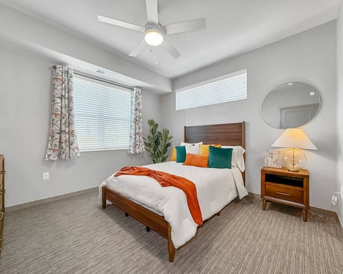 Well-furnished resident bedroom with modern decor