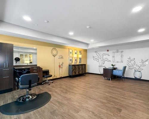 Interior view of a hair salon with styling stations