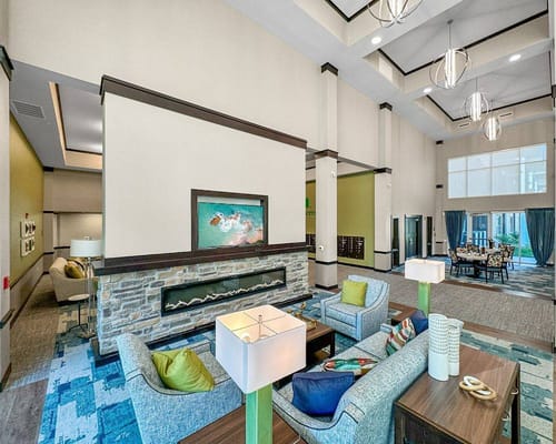 Bright lobby area with seating and decorative elements