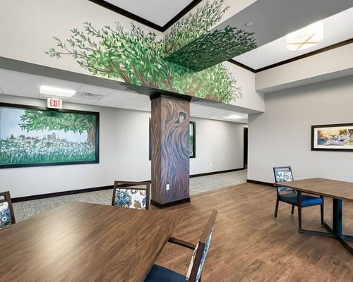 Interior view of a common area with mural decorations