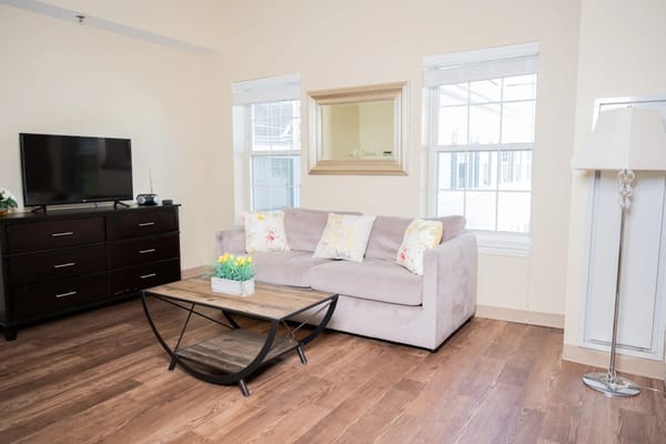 Cozy sitting area in a senior living facility room