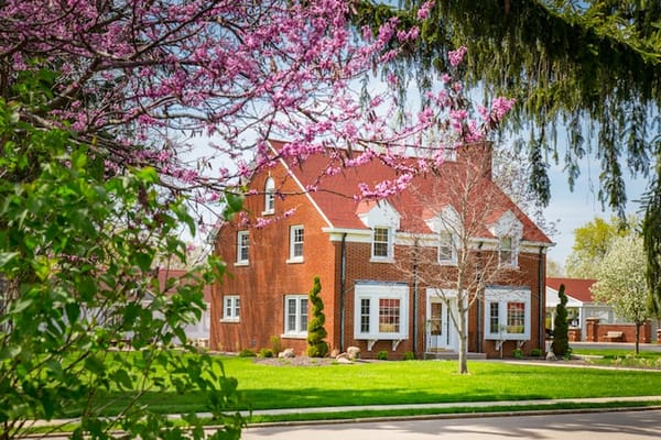 Beautiful exterior view of a residential building with flowers