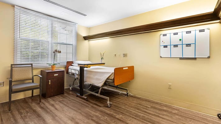 Private resident room with a bed and window