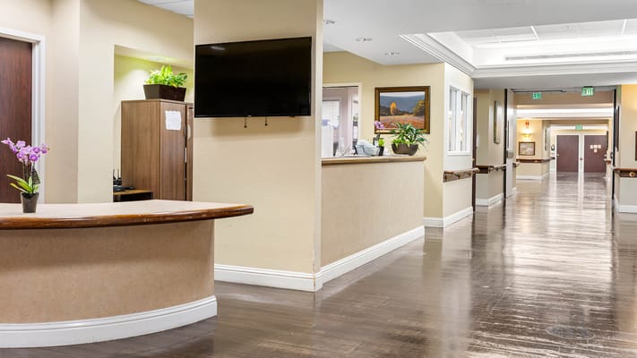 Well-lit interior corridor and reception area
