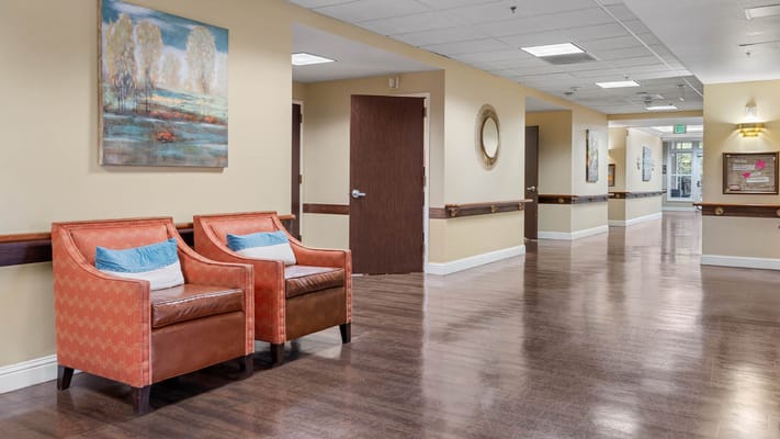Bright interior hallway with seating area