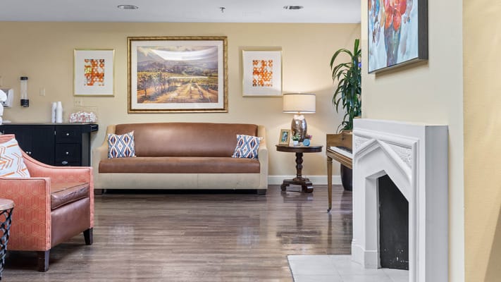 Cozy common area with seating and artwork