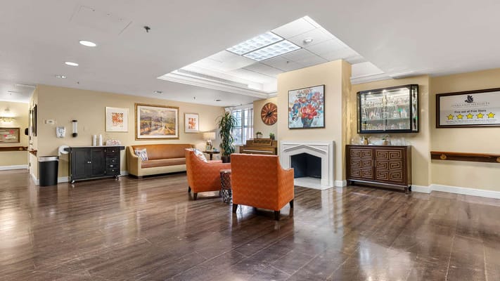 A cozy lobby area with seating and artwork