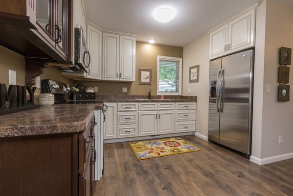 Bright kitchen area with modern appliances