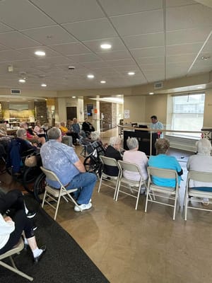 Residents attending a community event in a common area