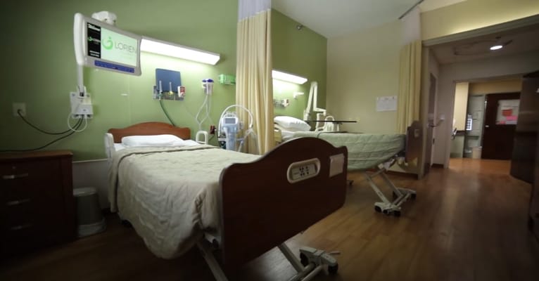 Interior view of a resident room with medical equipment