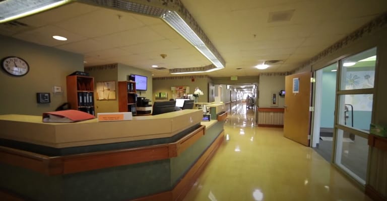 Reception area with hallway in background