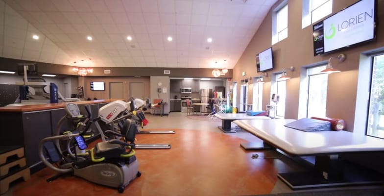 Interior view of a fitness area with exercise equipment