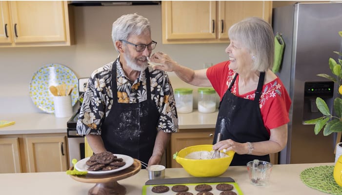 Residents baking cookies in a cozy kitchen