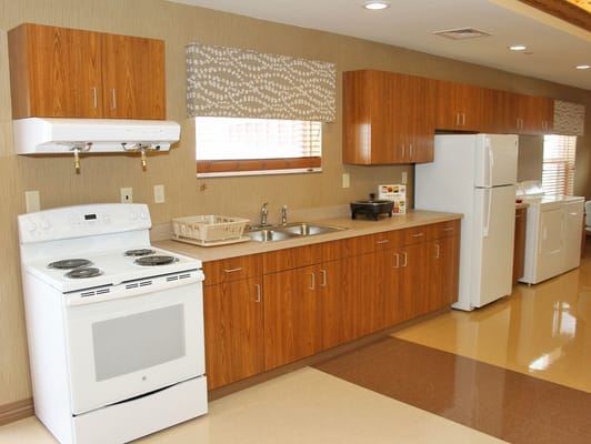 Interior kitchen area with appliances and cabinetry