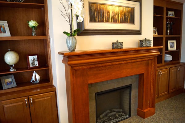 Interior view of a common area with a fireplace