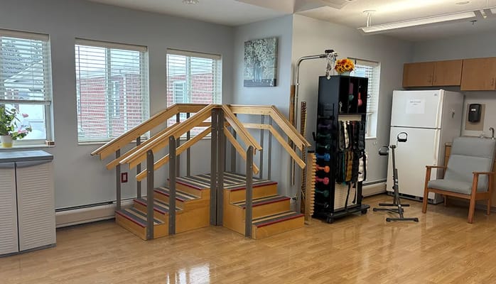 Rehabilitation area with stairs and exercise equipment