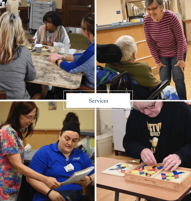 Residents and staff engaging in activities in the facility