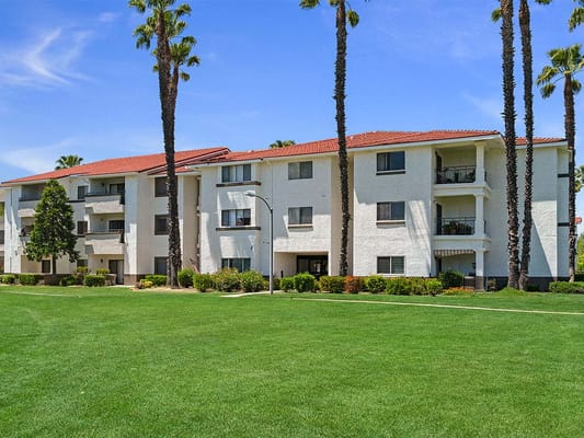 Exterior view of Westmont of Riverside building with landscaping