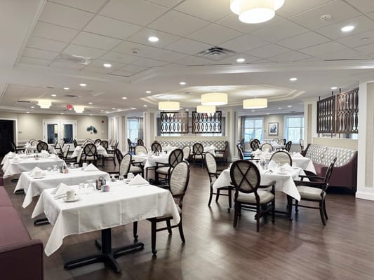 Dining room set for a meal at the facility