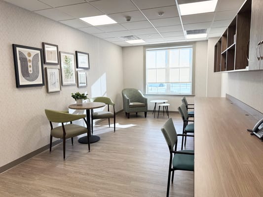 Bright interior space with seating and artwork