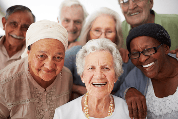 Residents smiling together in a joyful group
