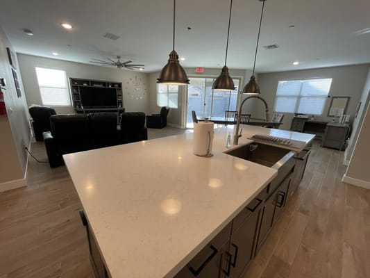 Bright common area with modern amenities and furniture