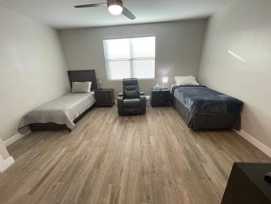 A view of a resident room with two beds
