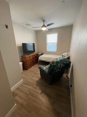 Cozy resident room with basic furniture