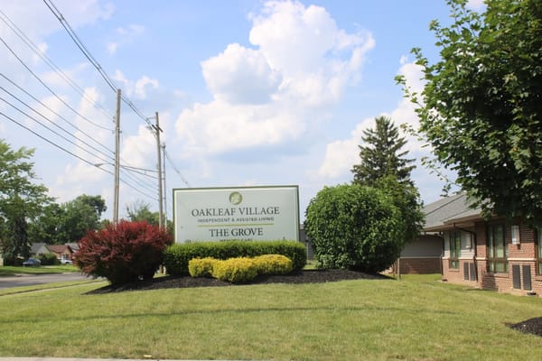 Exterior view of The Grove at Oakleaf Village sign