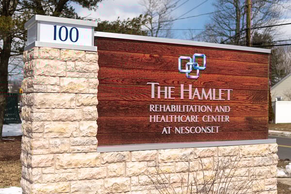 Exterior sign for The Hamlet Rehabilitation and Healthcare Center