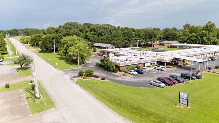 Aerial view of AHC VanAyer facility with green surroundings