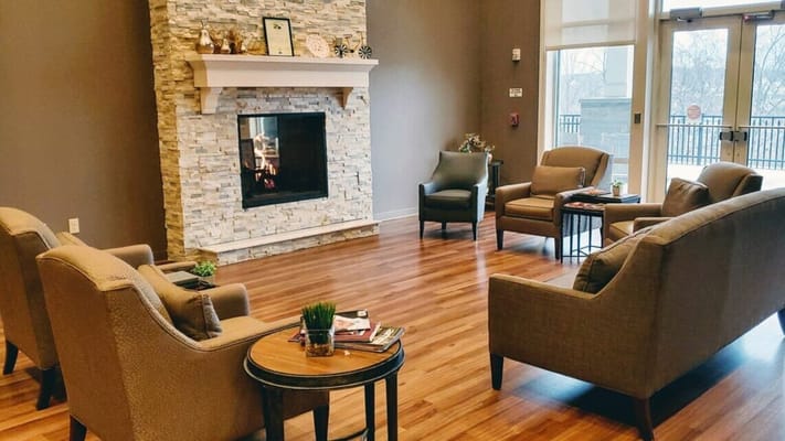 Welcoming common area with a fireplace and seating