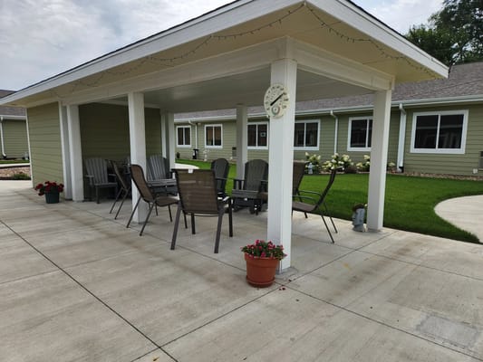 Outdoor seating area with chairs and tables