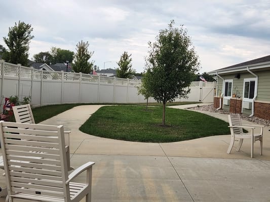 Outdoor courtyard with seating and trees