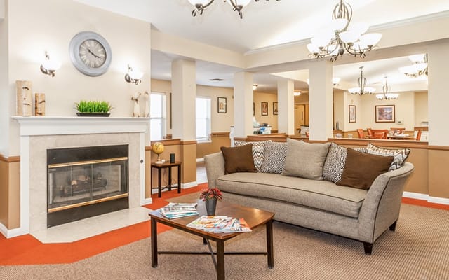 Cozy common area with seating and fireplace