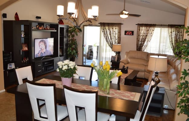 Bright common area with dining table and living space